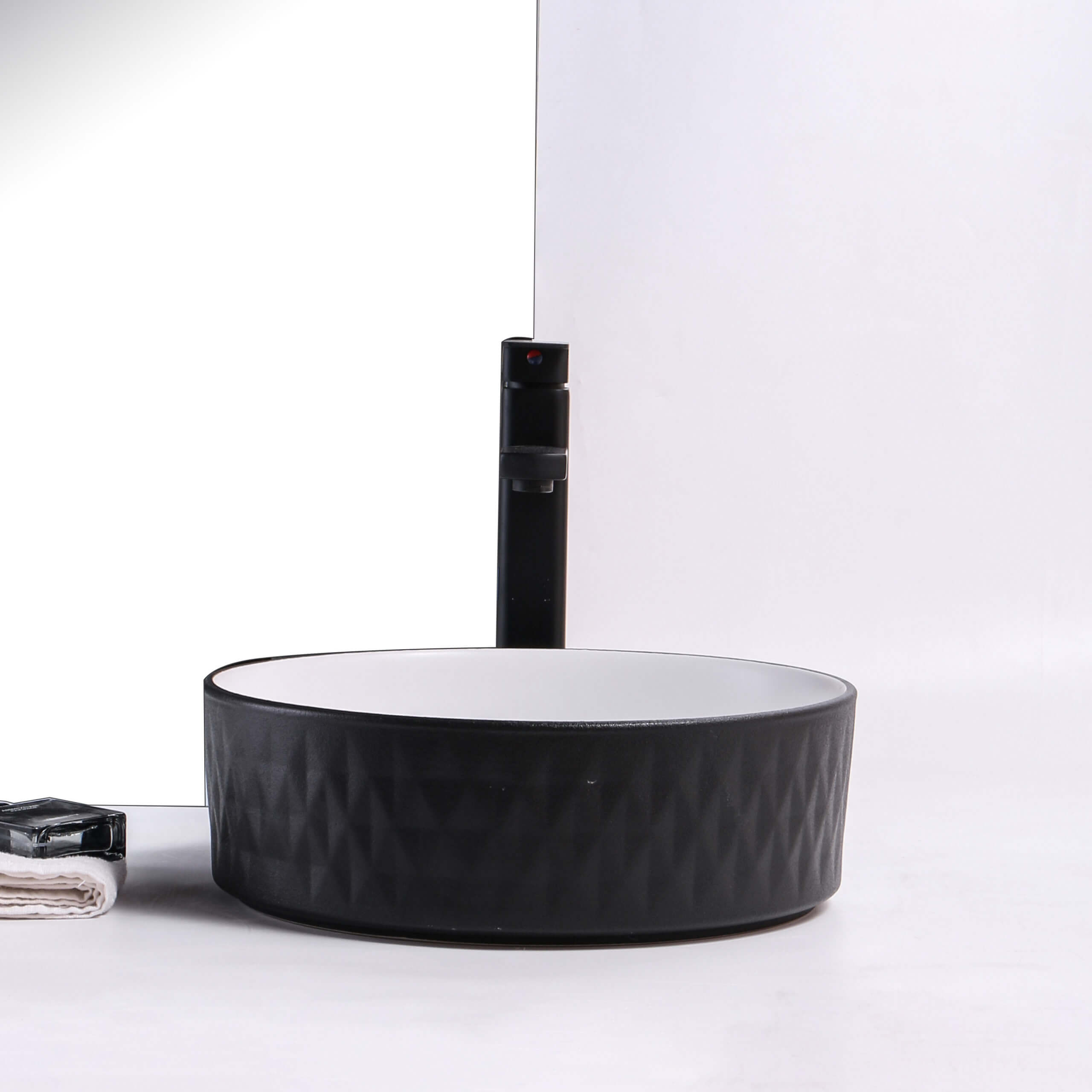 Claya Diamond Round Textured Matte Black Above counter art basins